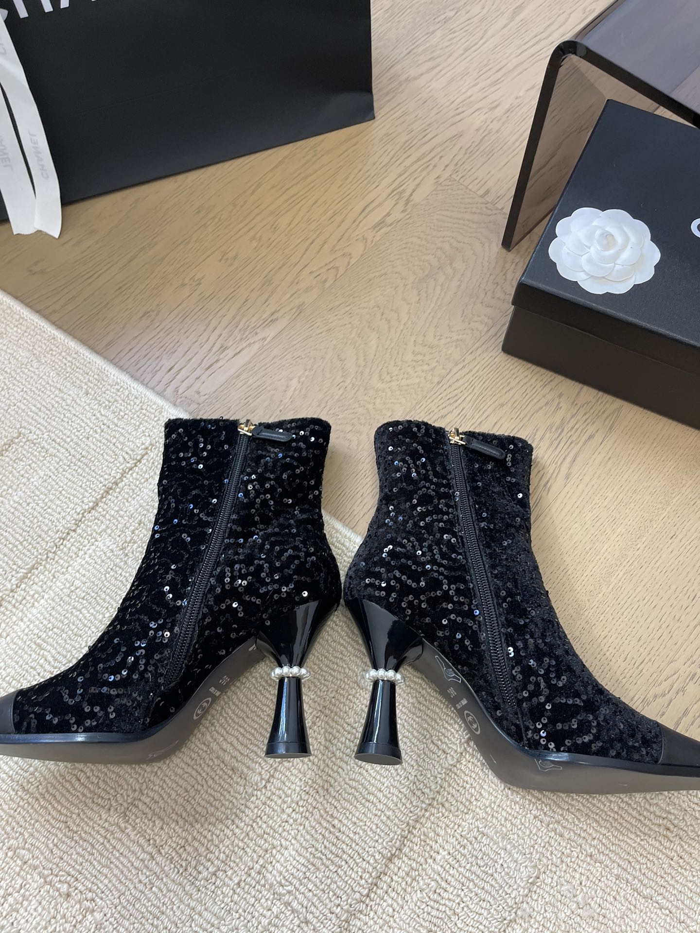 CHANEL BONGADE BOOTS IN BLACK CALFSKIN AND SEQUINS