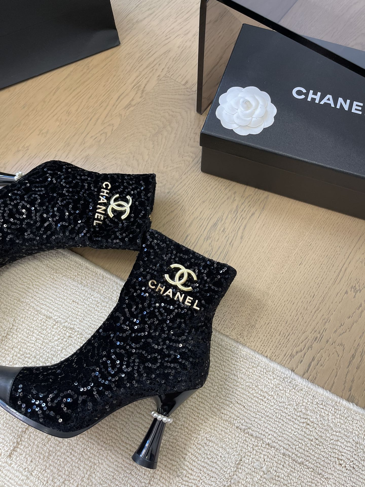 CHANEL BONGADE BOOTS IN BLACK CALFSKIN AND SEQUINS