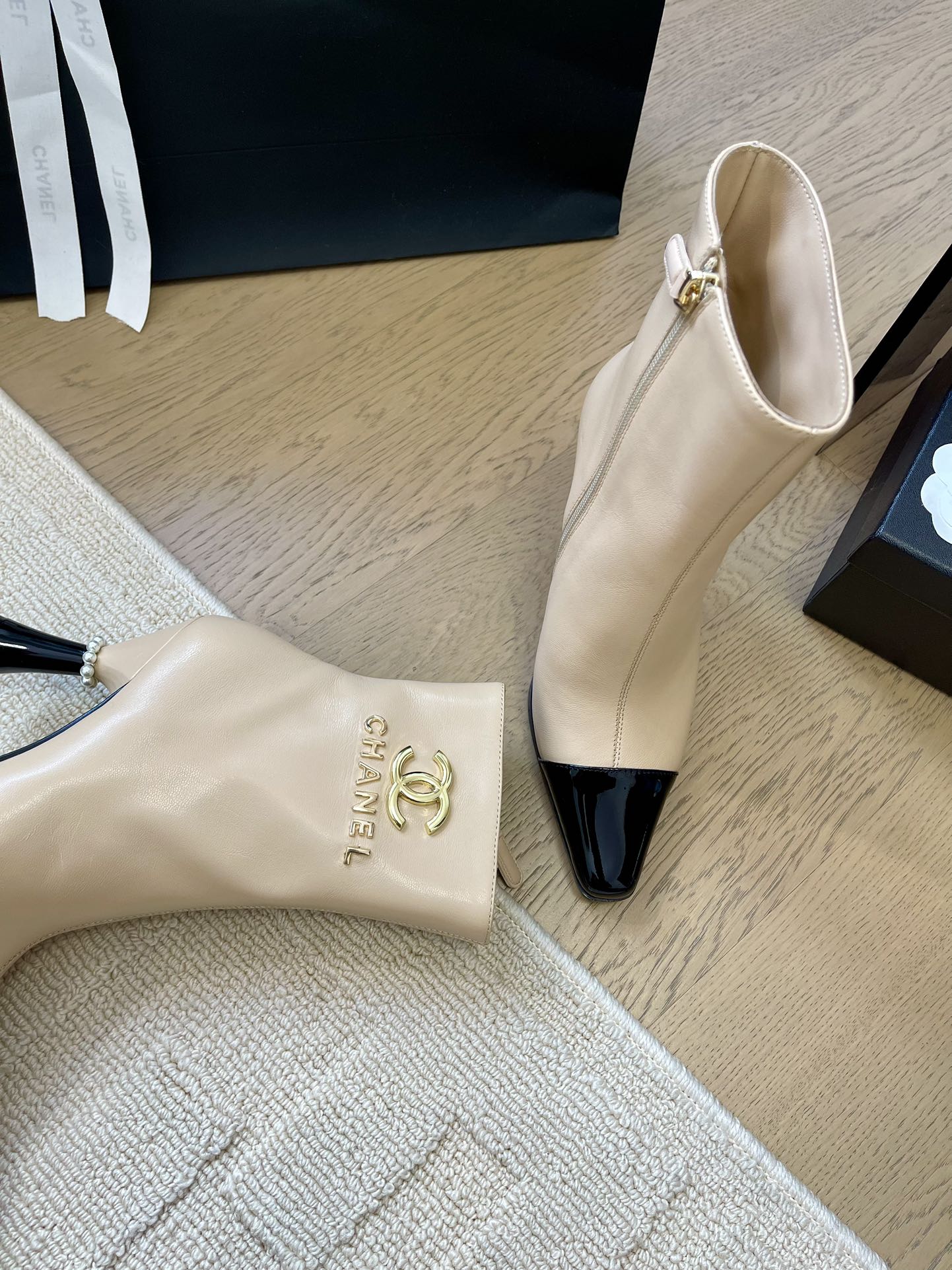 CHANEL BONGADE BOOTS IN BEIGE MIX BLACK CALFSKIN