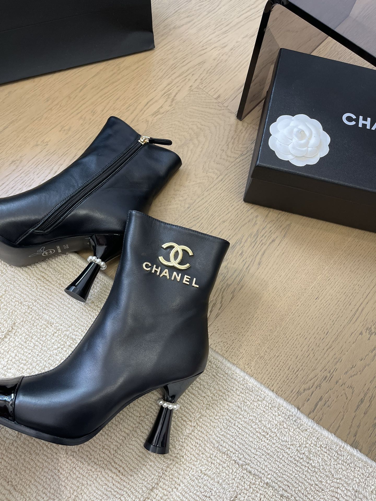 CHANEL BONGADE BOOTS IN BLACK CALFSKIN