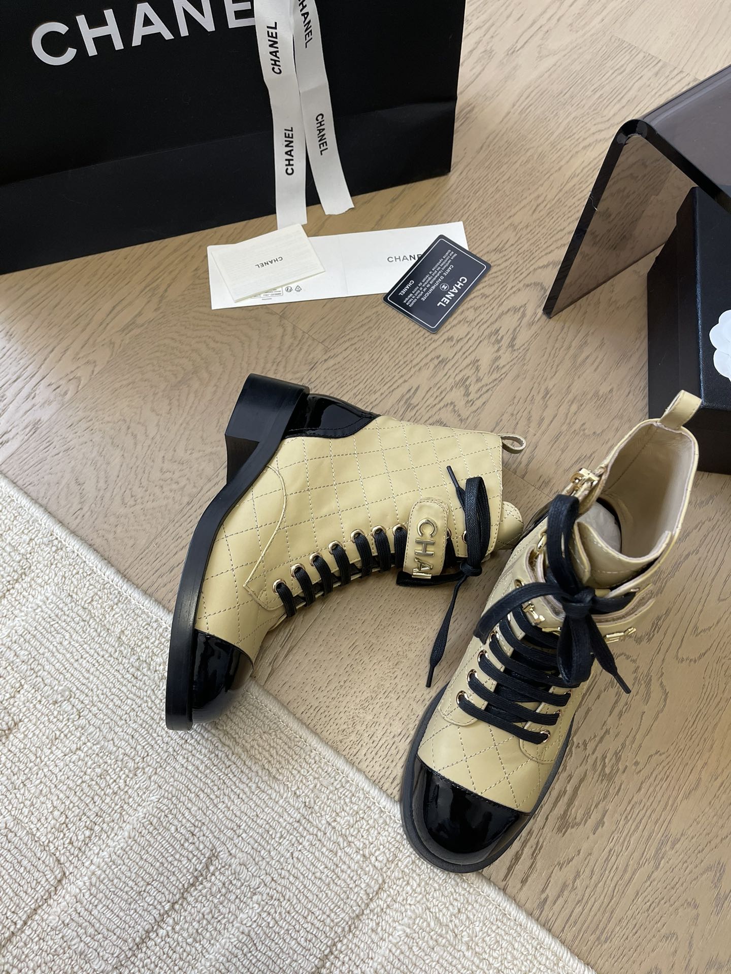 CHANEL ALPHABET MARTIN BOOTS IN FLAX YELLOW LAMBSKIN
