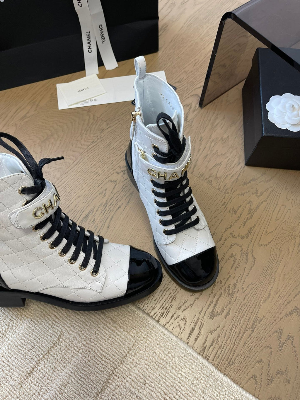 CHANEL ALPHABET MARTIN BOOTS IN WHITE LAMBSKIN