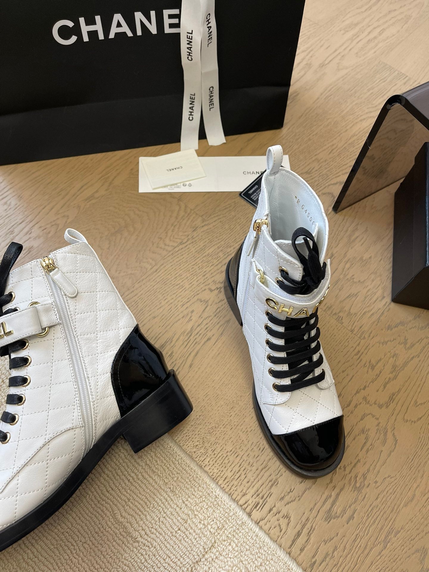 CHANEL ALPHABET MARTIN BOOTS IN WHITE LAMBSKIN