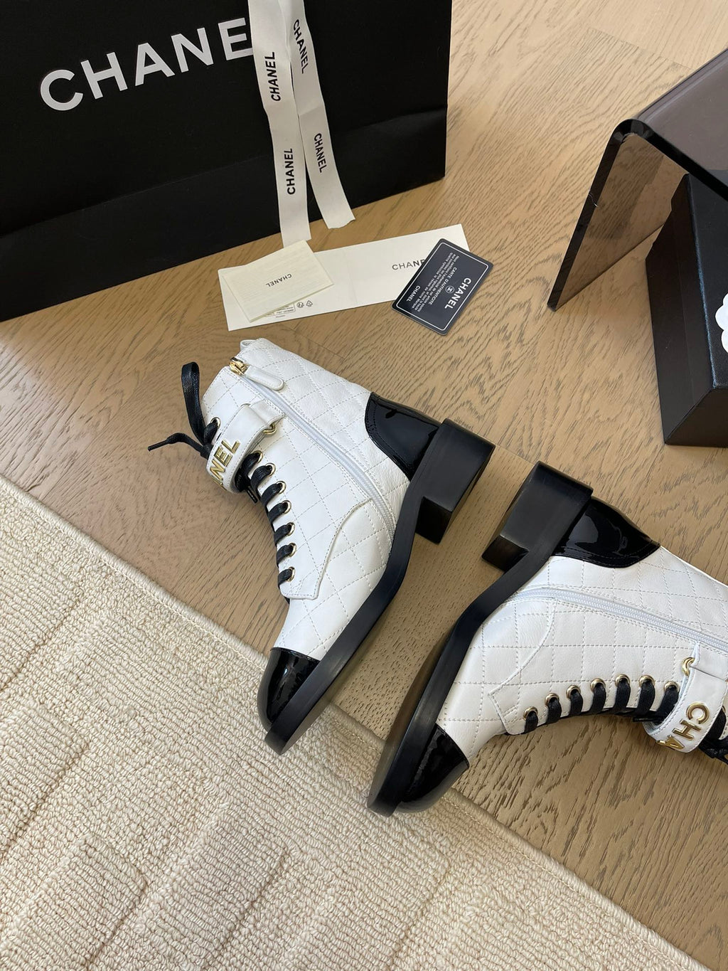 CHANEL ALPHABET MARTIN BOOTS IN WHITE LAMBSKIN