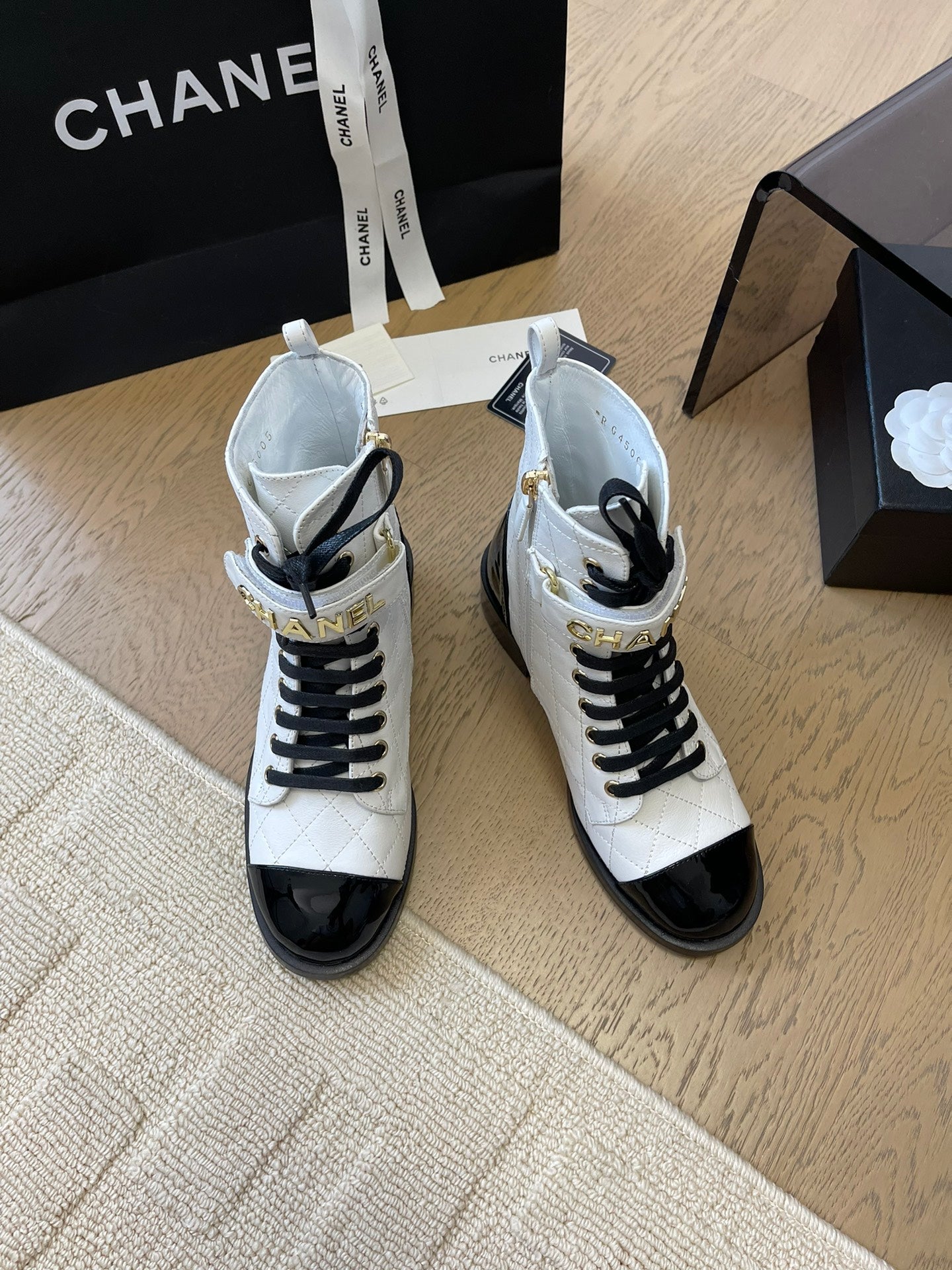 CHANEL ALPHABET MARTIN BOOTS IN WHITE LAMBSKIN