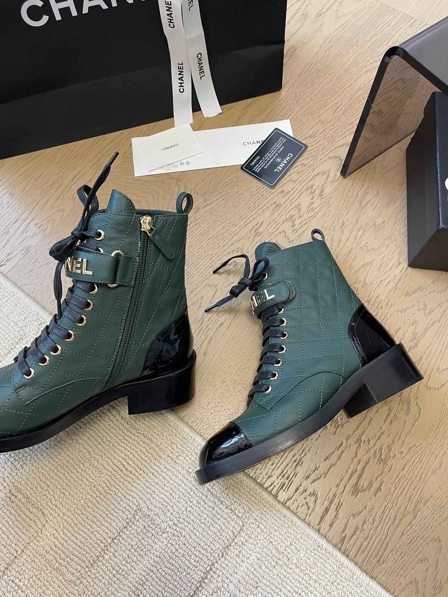 CHANEL ALPHABET MARTIN BOOTS IN FOREST GREEN LAMBSKIN