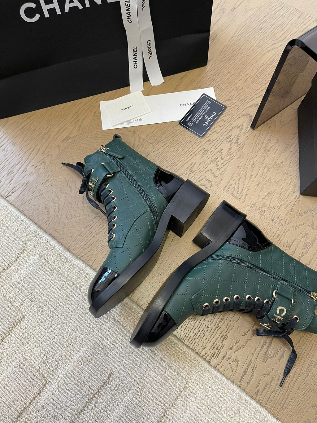CHANEL ALPHABET MARTIN BOOTS IN FOREST GREEN LAMBSKIN