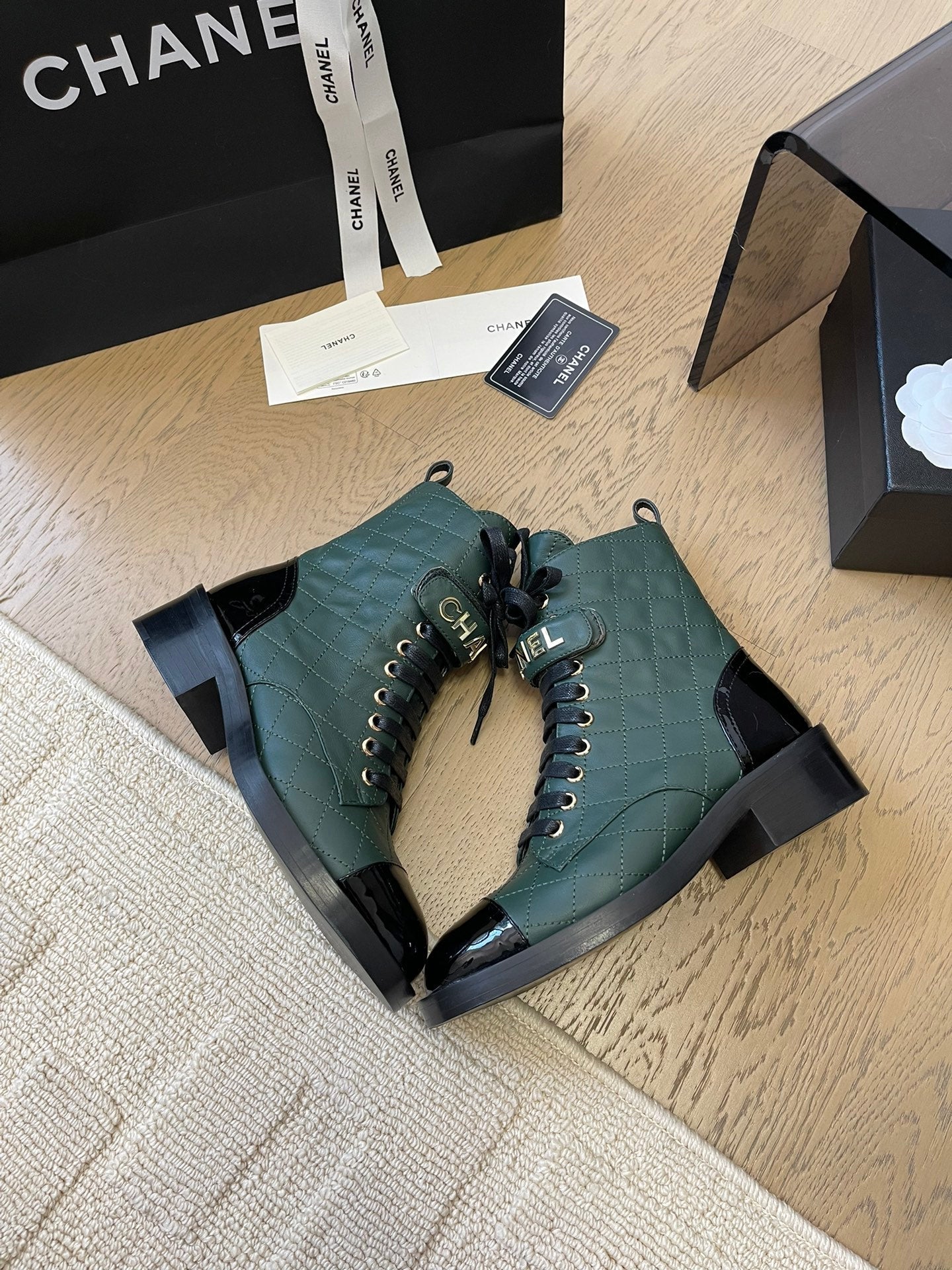 CHANEL ALPHABET MARTIN BOOTS IN FOREST GREEN LAMBSKIN