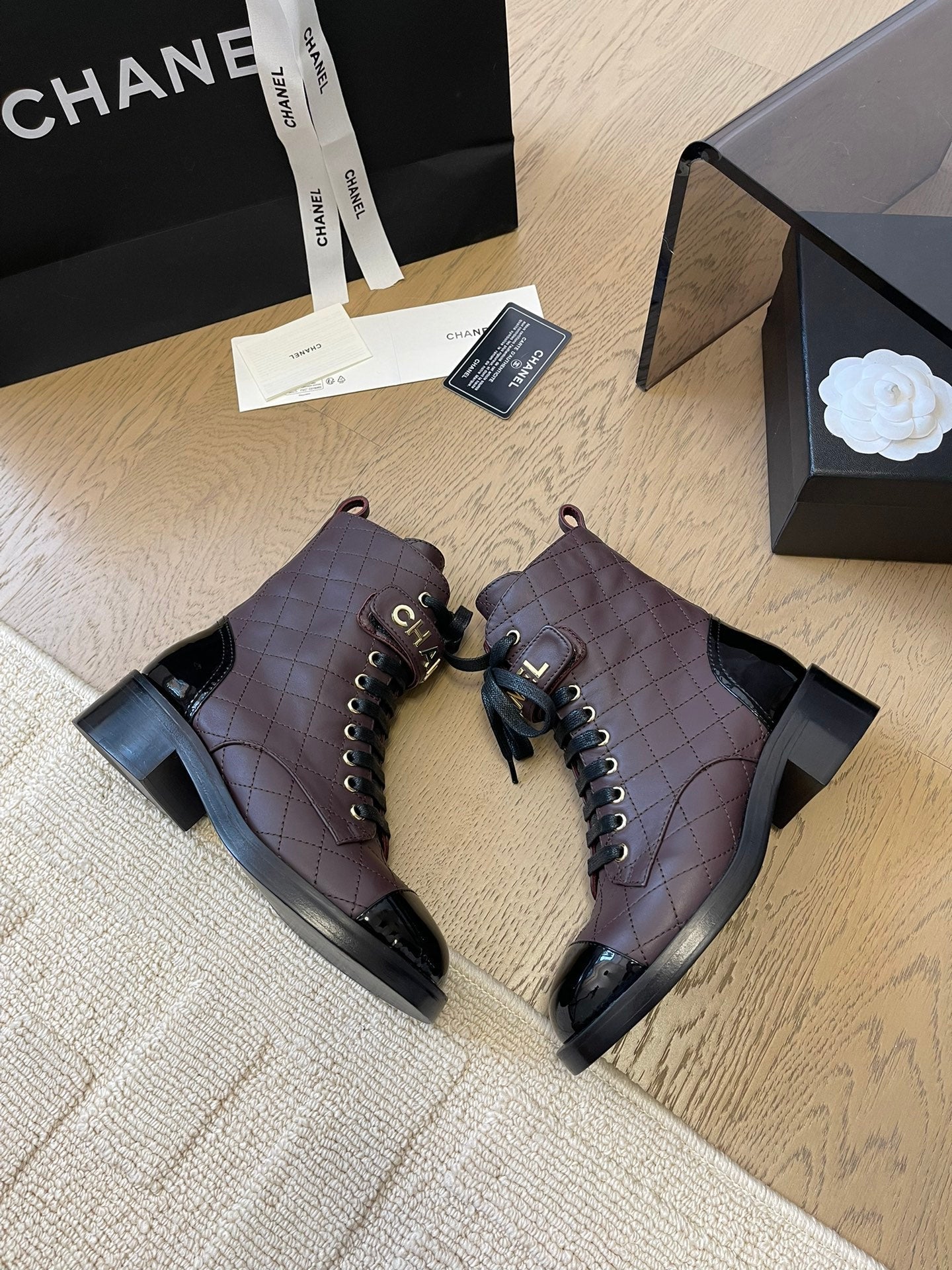CHANEL ALPHABET MARTIN BOOTS IN BRUNETTE BROWN MIX BLACK LAMBSKIN