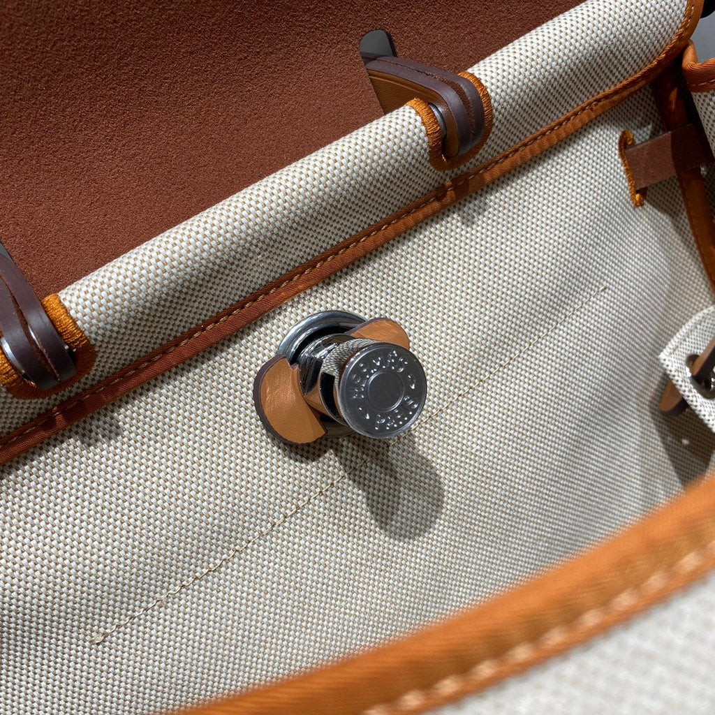 HERMES HERBAG A DOS ZIP RETOURNE BACKPACK 29 IN OFF-WHITE CANVAS AND BROWN CALFSKIN