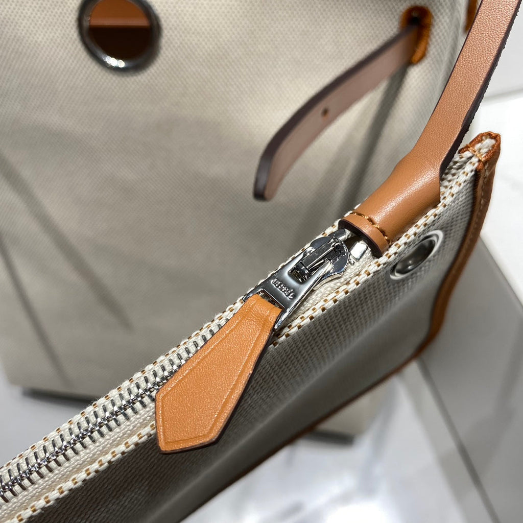HERMES HERBAG A DOS ZIP RETOURNE BACKPACK 29 IN OFF-WHITE CANVAS AND BROWN CALFSKIN