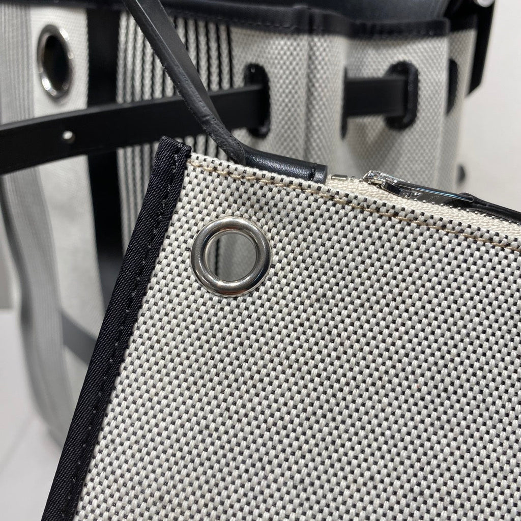 HERMES HERBAG A DOS ZIP RETOURNE BACKPACK 29 IN OFF-WHITE MIX BLACK CANVAS AND CALFSKIN