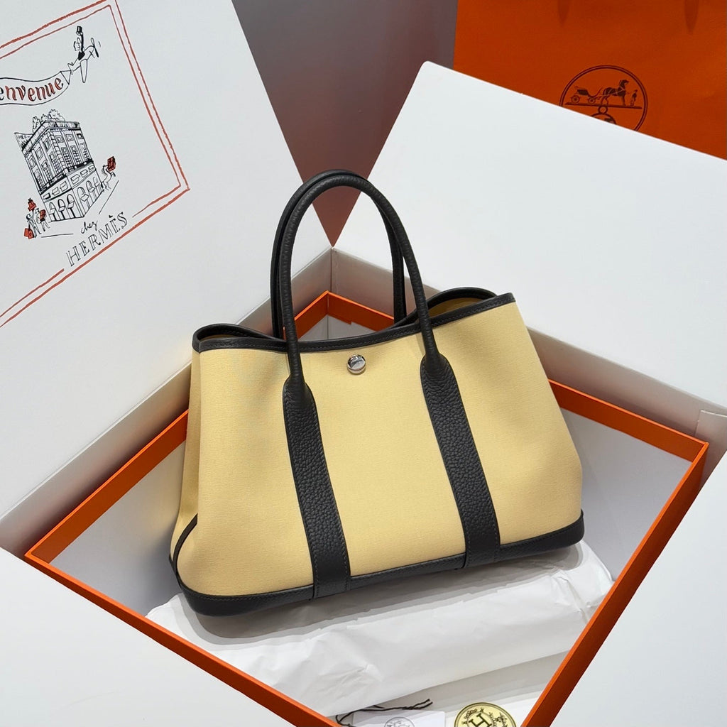 HERMES GARDEN PARTY 30CM IN DARK BEIGE TOILETS COTTON CANVAS AND BLACK CALFSKIN