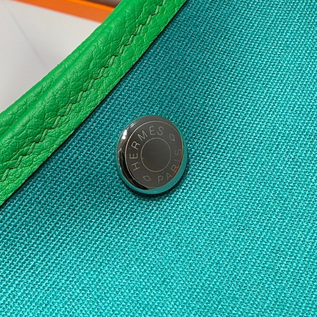 HERMES GARDEN PARTY 30CM IN CADMIUM GREEN TOILETS COTTON CANVAS AND GREEN CALFSKIN