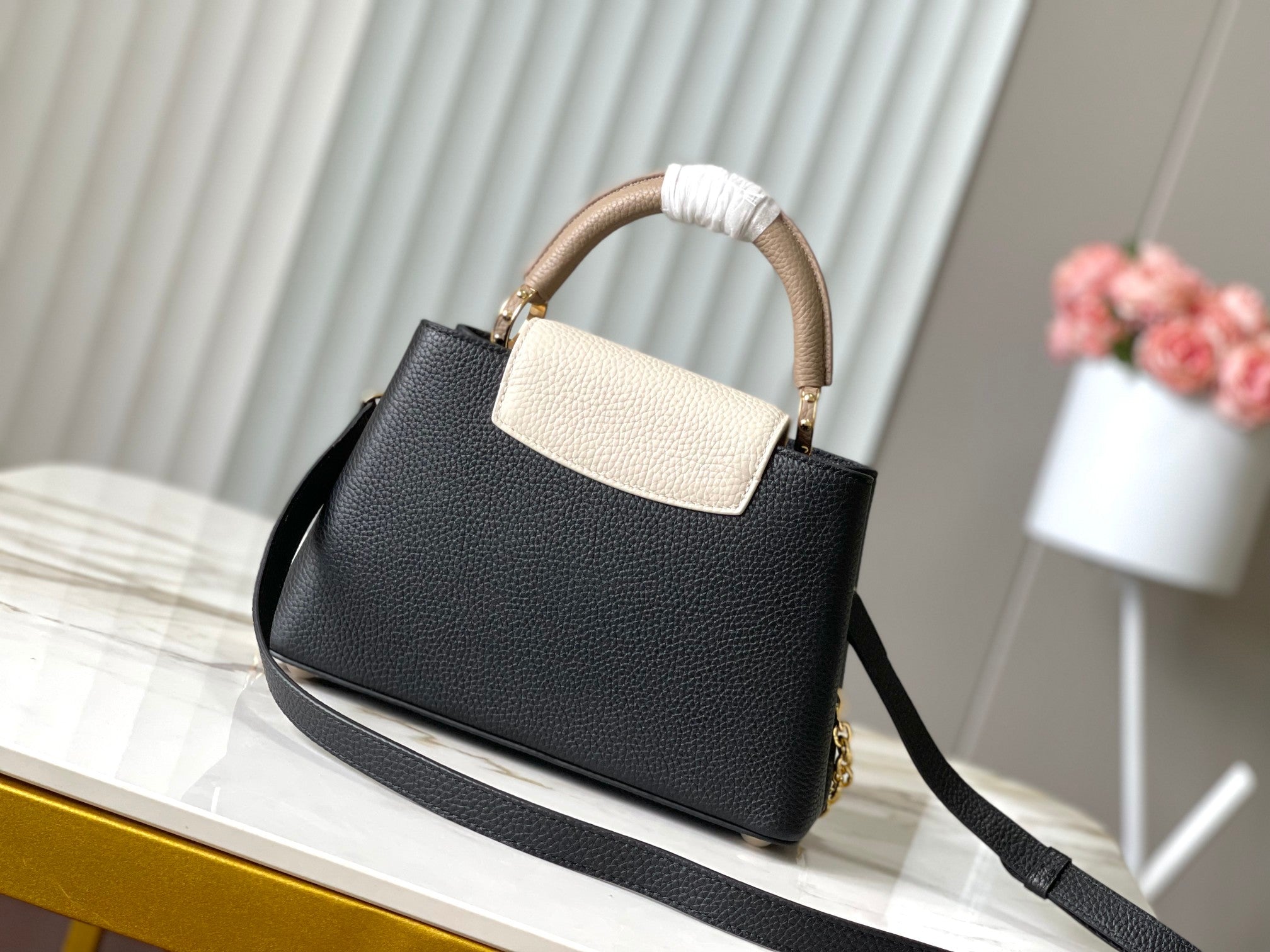 LOUIS VUITTON CAPUCINES BB 27 IN BLACK MIX WHITE TAURILLON GOLD HARDWARE