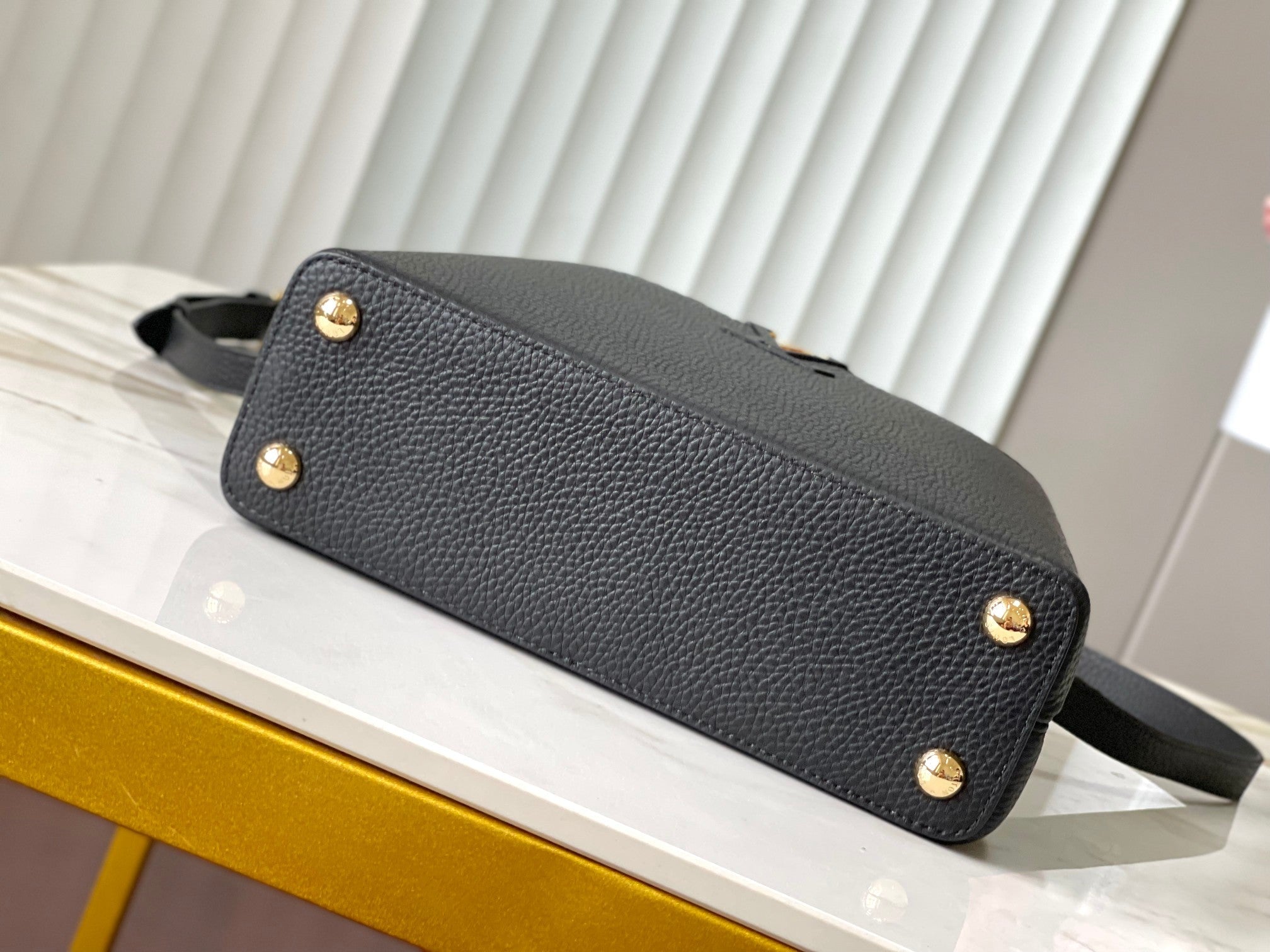 LOUIS VUITTON CAPUCINES BB 27 IN BLACK MIX WHITE TAURILLON GOLD HARDWARE
