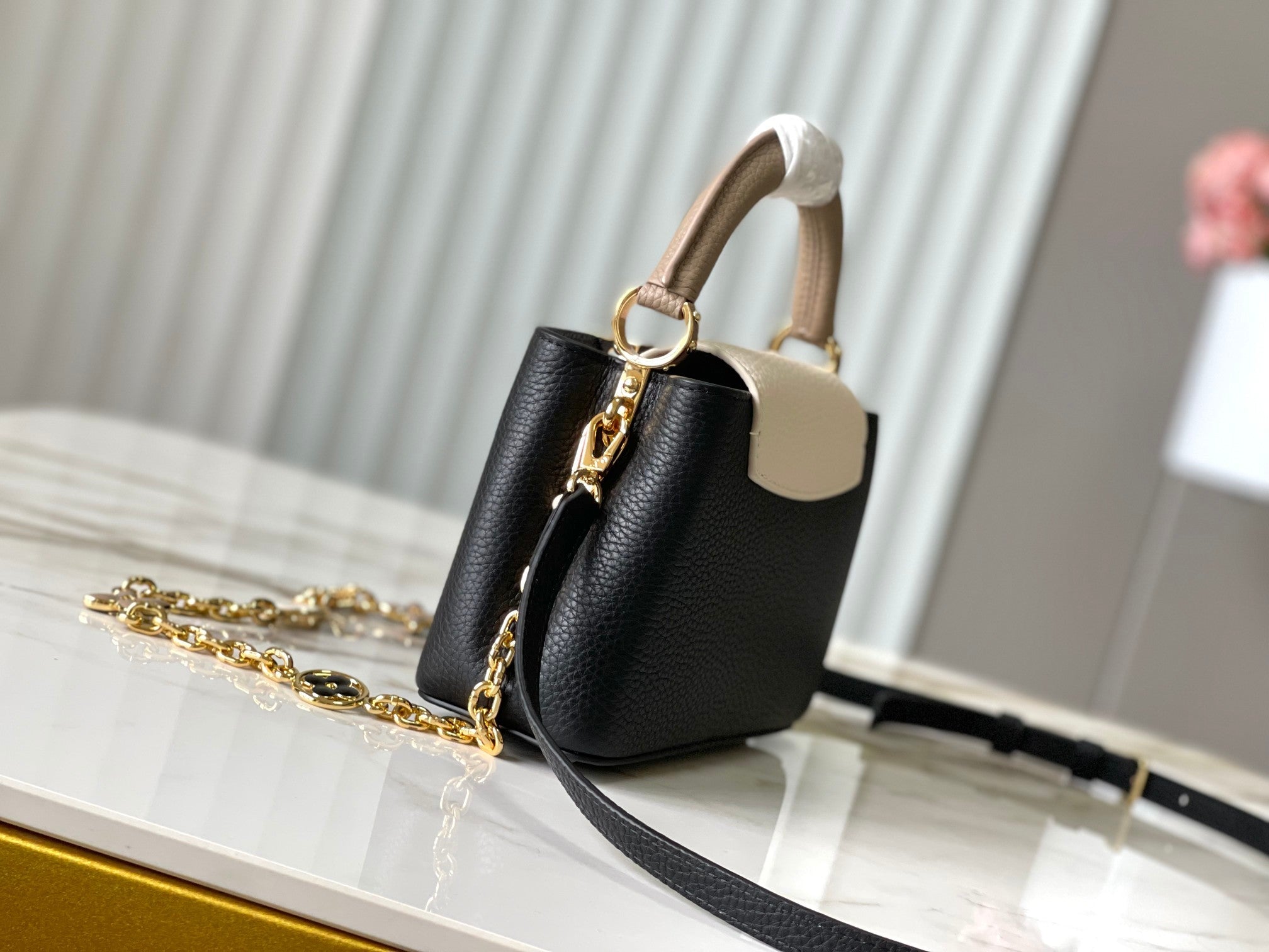 LOUIS VUITTON CAPUCINES MINI 21 IN BLACK MIX WHITE TAURILLON GOLD HARDWARE
