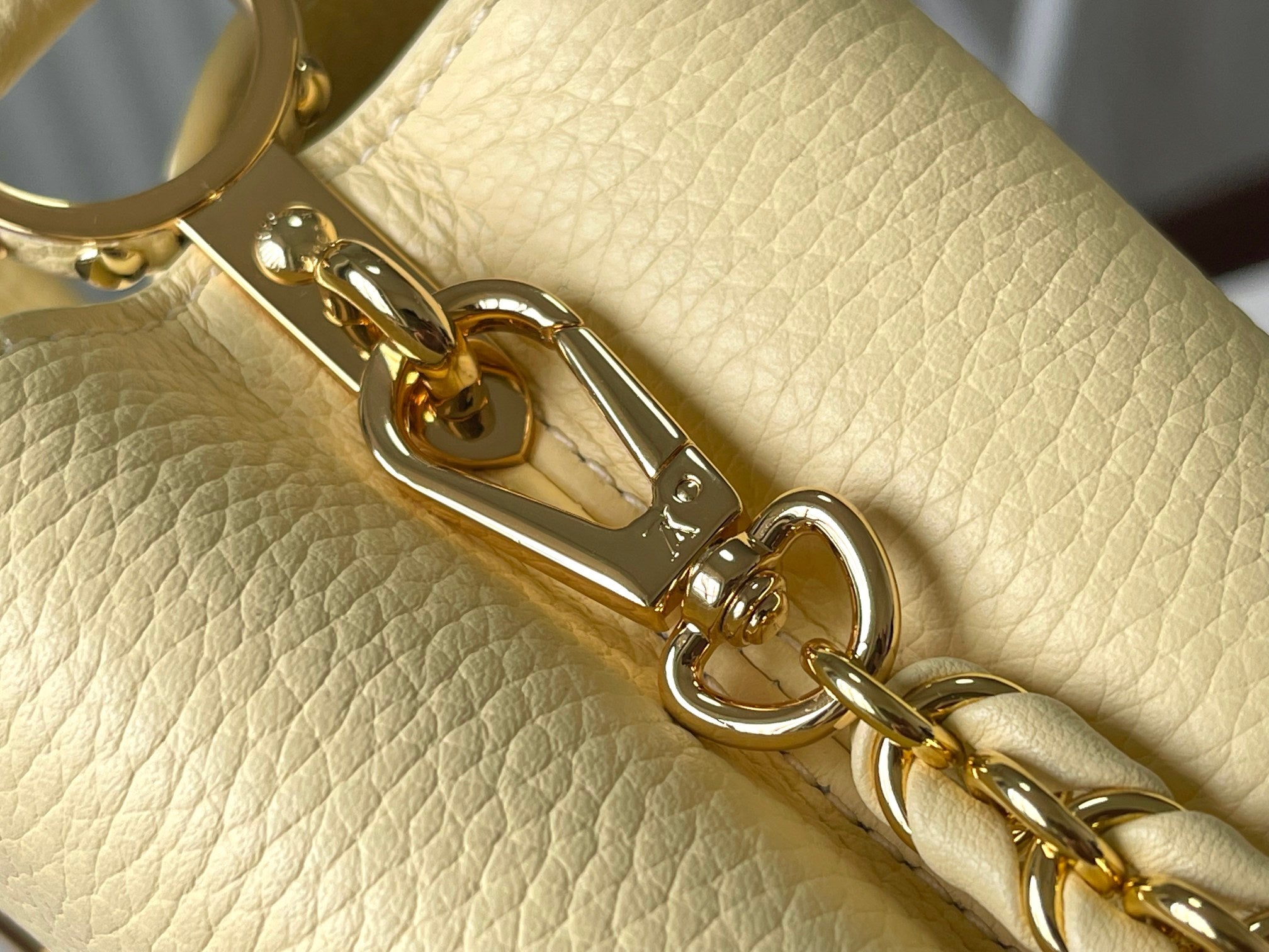 LOUIS VUITTON CAPUCINES EAST-WEST MINI 22 IN BANANA YELLOW TAURILLON GOLD HARDWARE