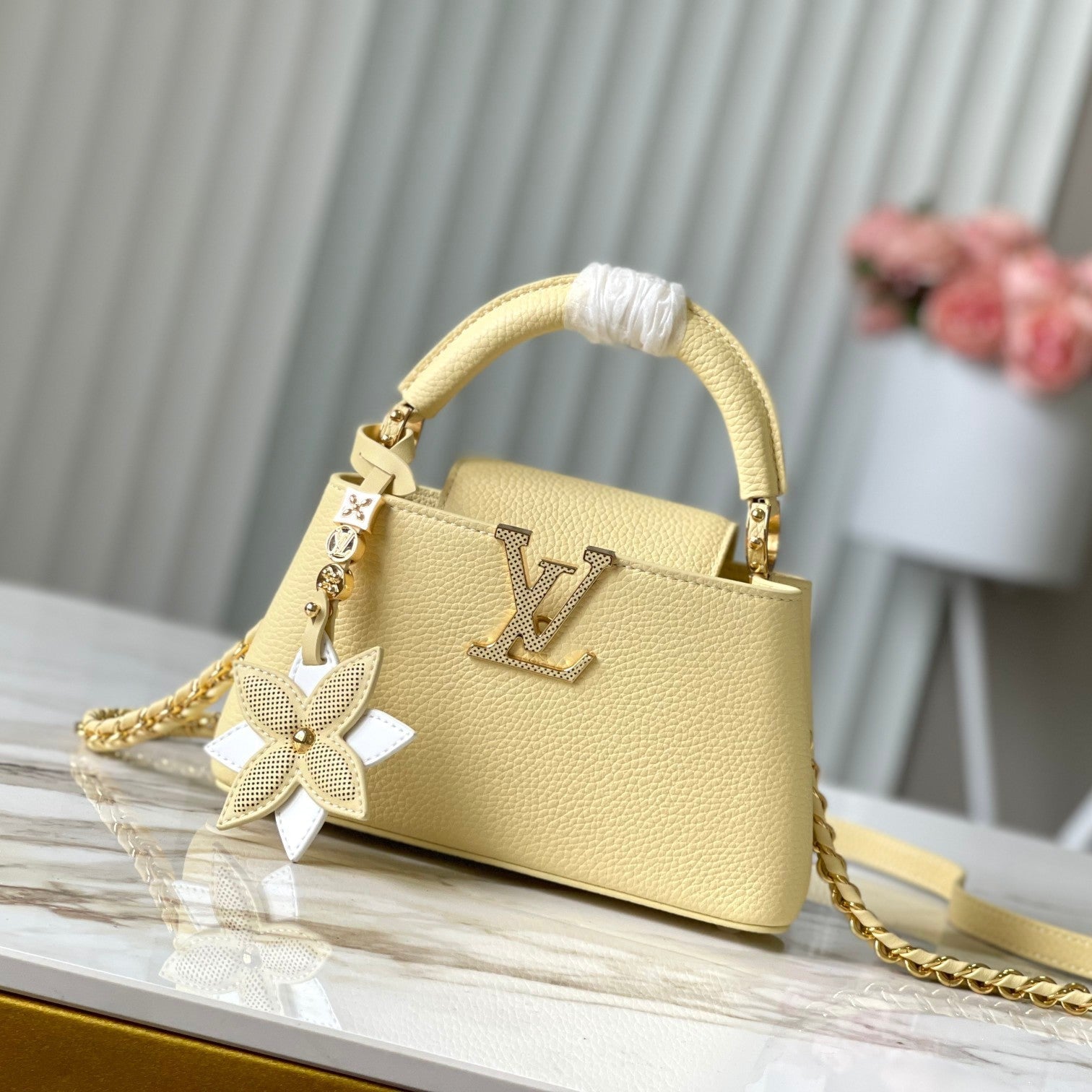 LOUIS VUITTON CAPUCINES EAST-WEST MINI 22 IN BANANA YELLOW TAURILLON GOLD HARDWARE