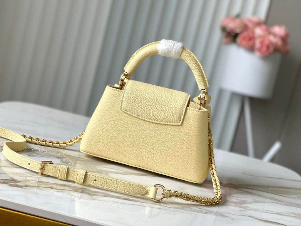 LOUIS VUITTON CAPUCINES EAST-WEST MINI 22 IN BANANA YELLOW TAURILLON GOLD HARDWARE