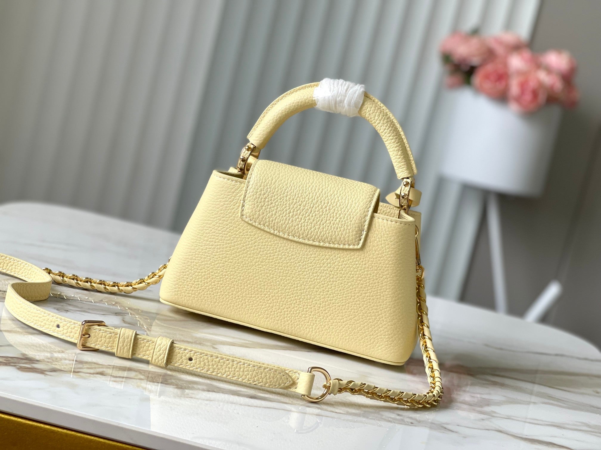 LOUIS VUITTON CAPUCINES EAST-WEST MINI 22 IN BANANA YELLOW TAURILLON GOLD HARDWARE