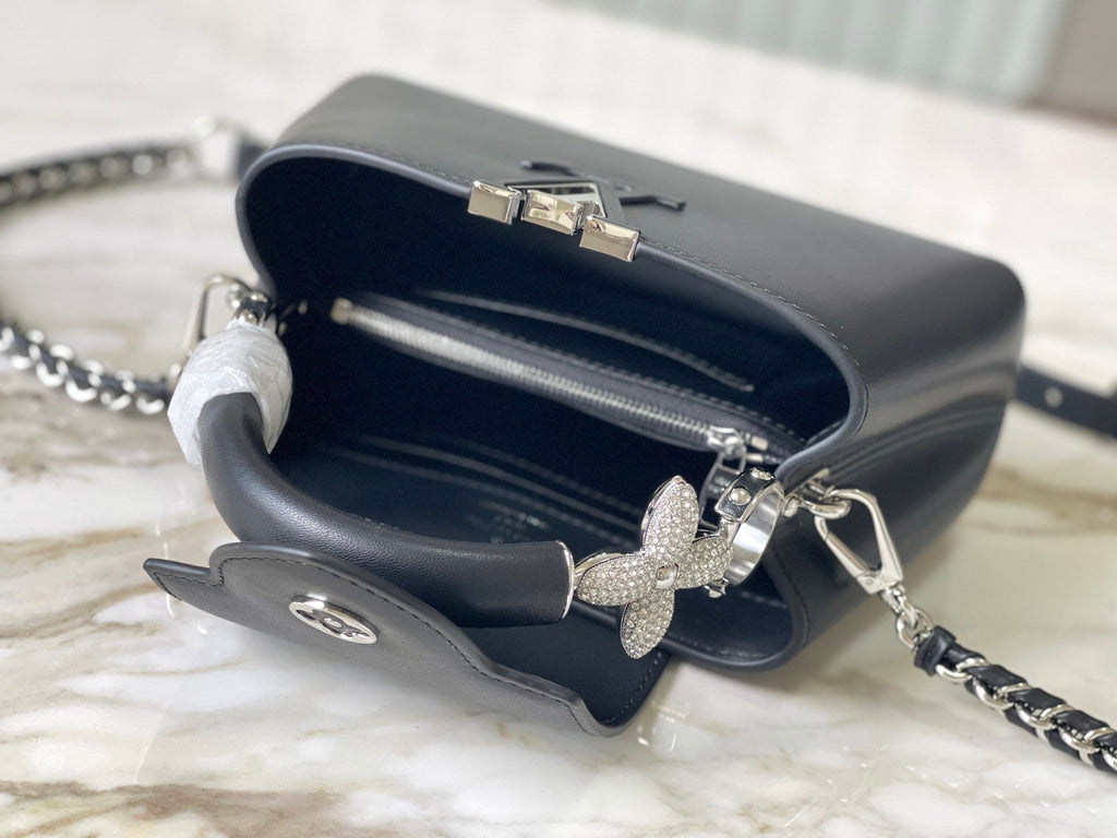LOUIS VUITTON CAPUCINES EAST-WEST MINI 22 IN BLACK SHEEPSKIN CRYSTAL AND SILVER HARDWARE