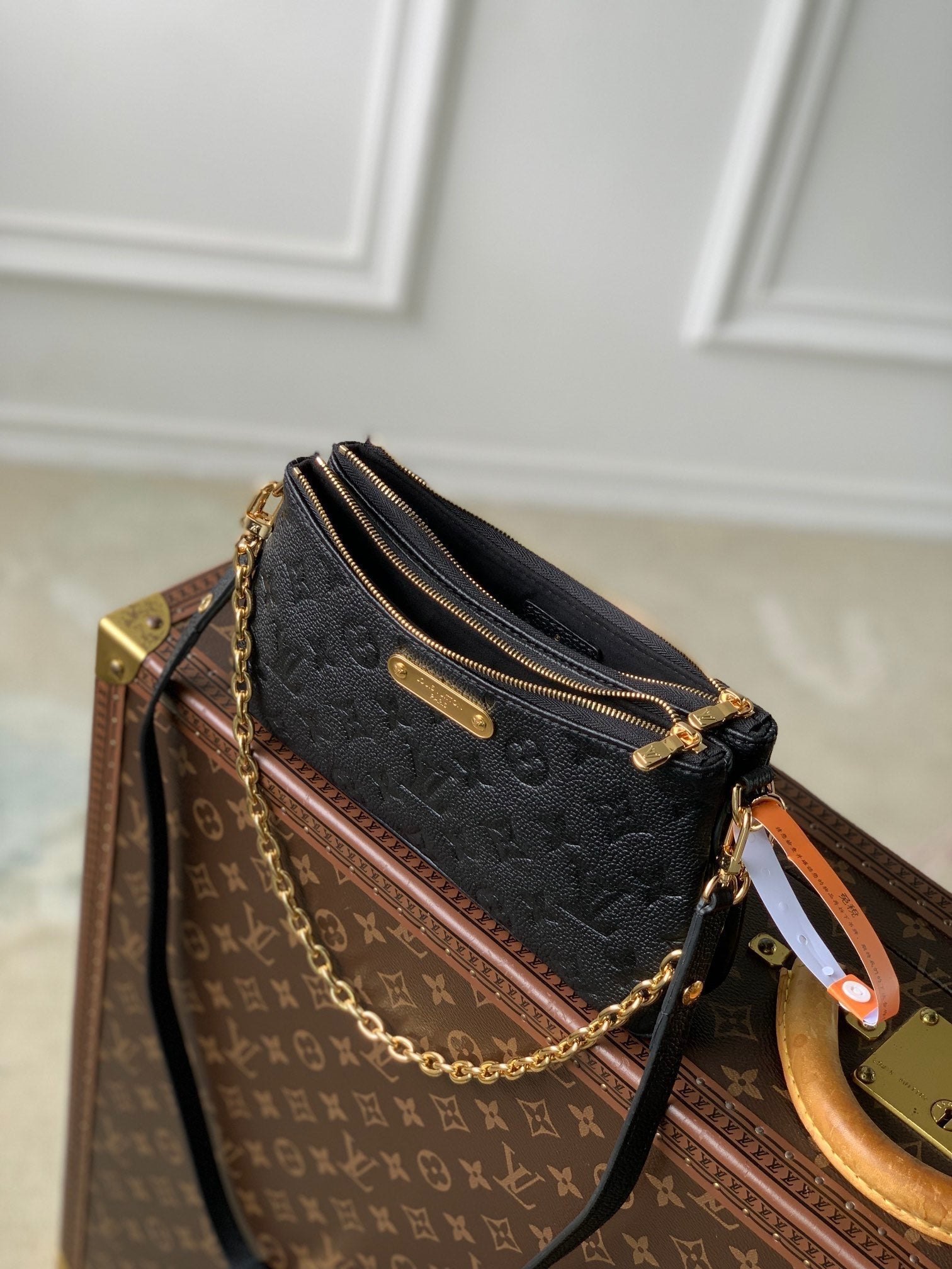 LOUIS VUITTON LIV POCHETTE BAG 24 IN BLACK MONOGRAM EMPREINTE LEATHER