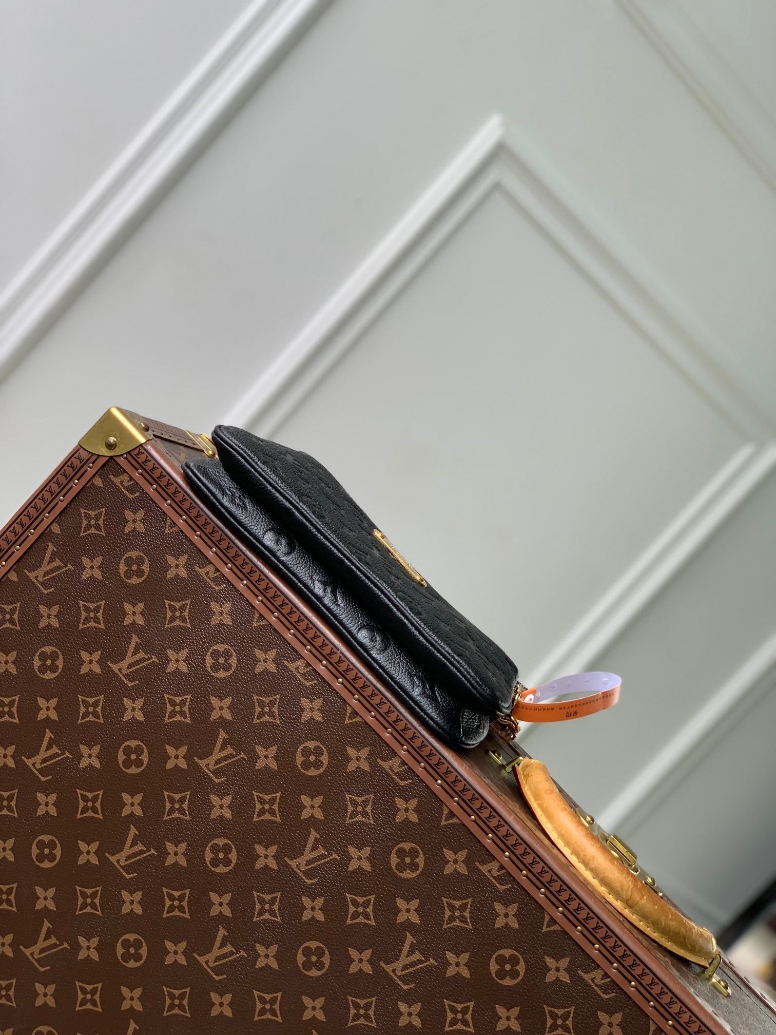 LOUIS VUITTON LIV POCHETTE BAG 24 IN BLACK MONOGRAM EMPREINTE LEATHER