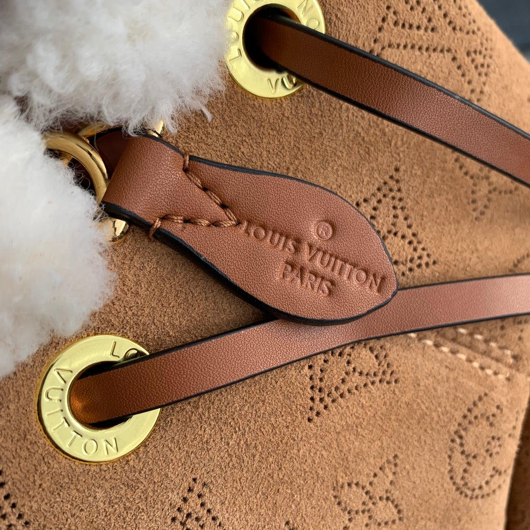 LOUIS VUITTON BELLA 22 IN CINNAMON BROWN MONOGRAM PERFORATED SUEDE AND WHITE SHEARLING TRIM