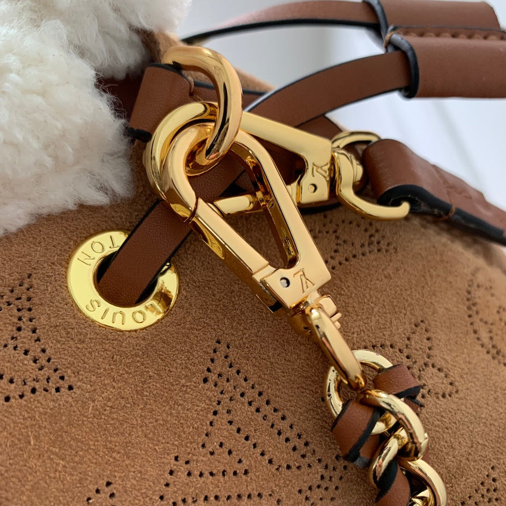 LOUIS VUITTON BELLA 22 IN CINNAMON BROWN MONOGRAM PERFORATED SUEDE AND WHITE SHEARLING TRIM