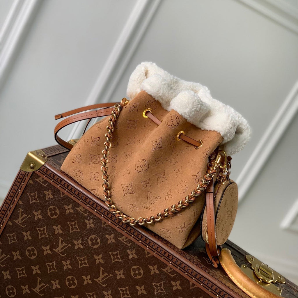 LOUIS VUITTON BELLA 22 IN CINNAMON BROWN MONOGRAM PERFORATED SUEDE AND WHITE SHEARLING TRIM