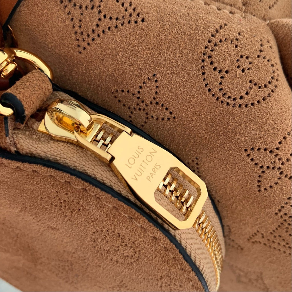 LOUIS VUITTON BELLA 22 IN CINNAMON BROWN MONOGRAM PERFORATED SUEDE AND WHITE SHEARLING TRIM
