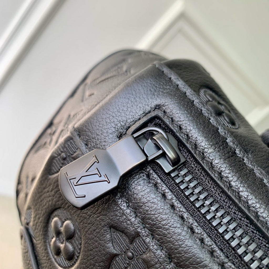 LOUIS VUITTON GETAWAY BACKPACK 50 IN BLACK MONOGRAM ECLIPSE CANVAS AND CALFSKIN EMBOSSED LOGO