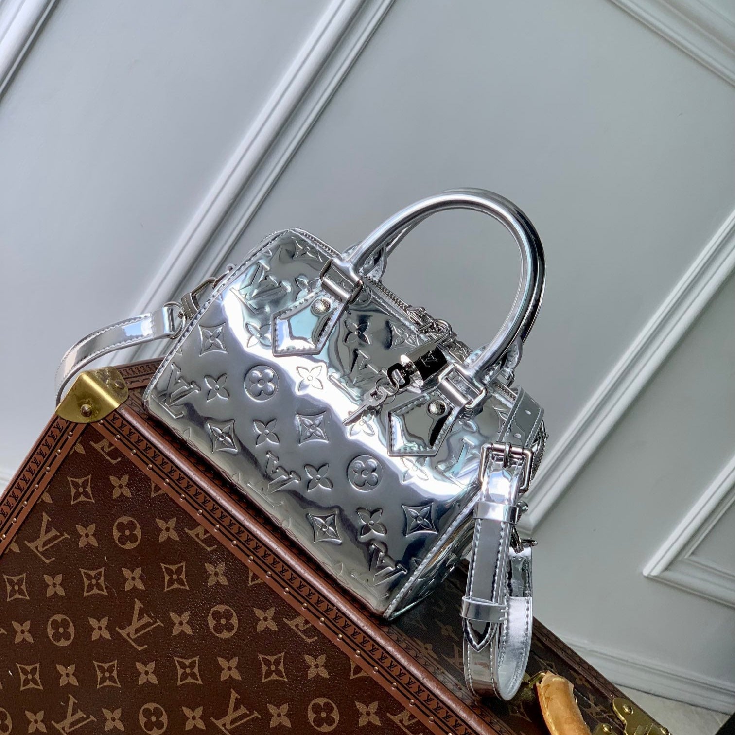 LOUIS VUITTON SPEEDY BANDOULIÈRE 20 IN SILVER MONOGRAM EMBOSSED CALFSKIN