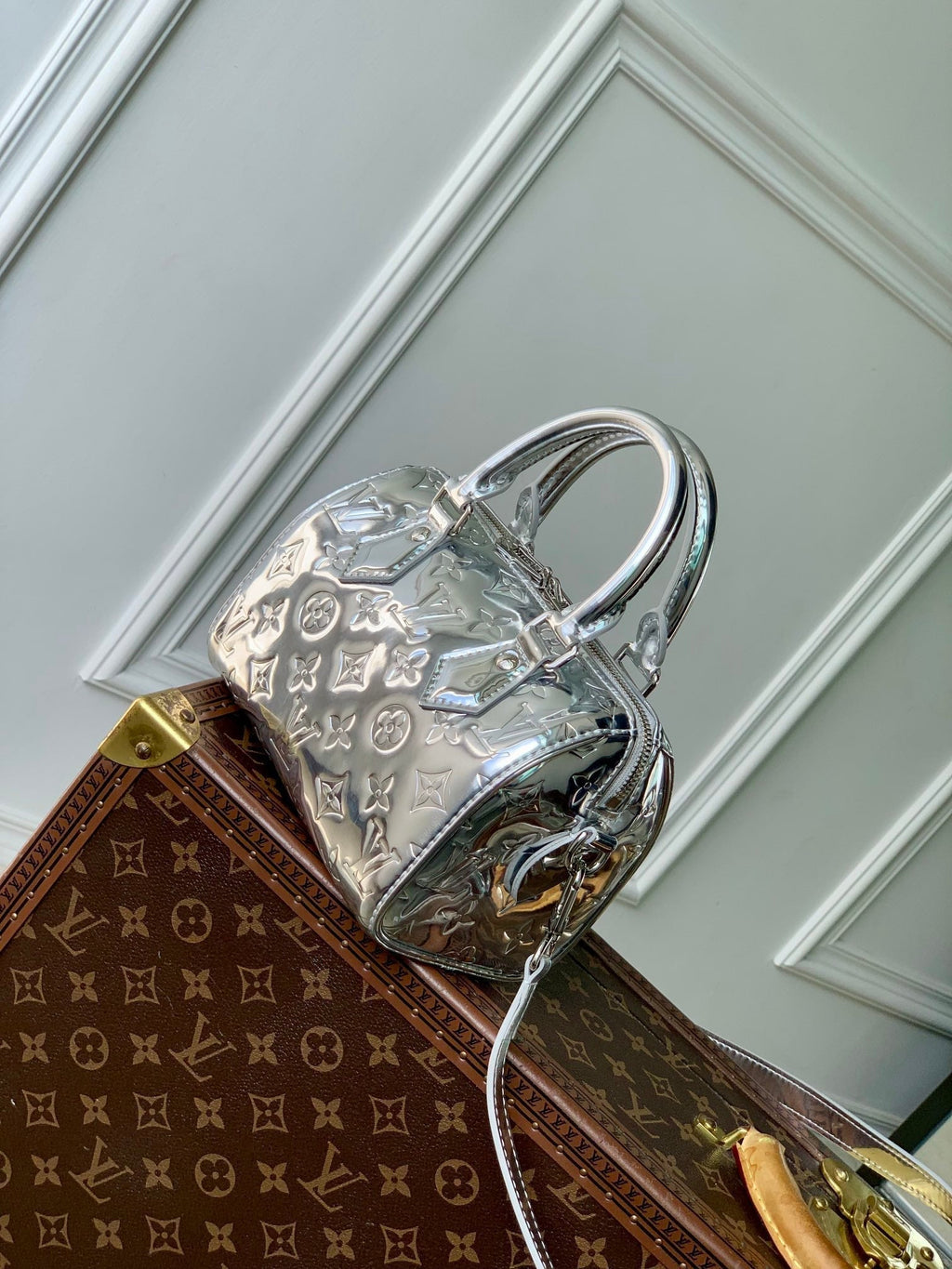 LOUIS VUITTON SPEEDY BANDOULIÈRE 20 IN SILVER MONOGRAM EMBOSSED CALFSKIN