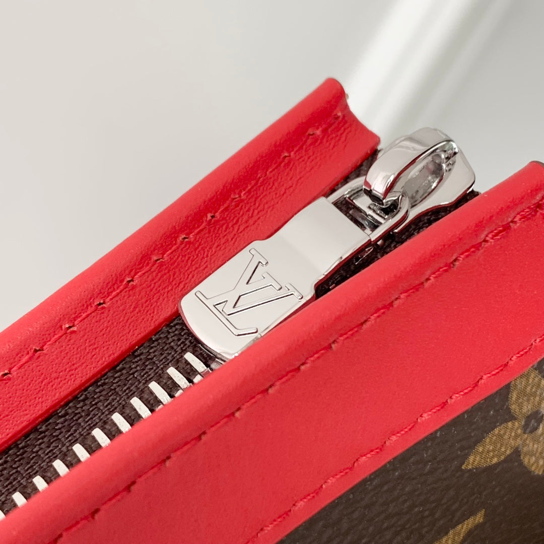 LOUIS VUITTON GASTON WEARABLE WALLET 18 IN BROWN MONOGRAM CANVAS MIX RED CALFSKIN