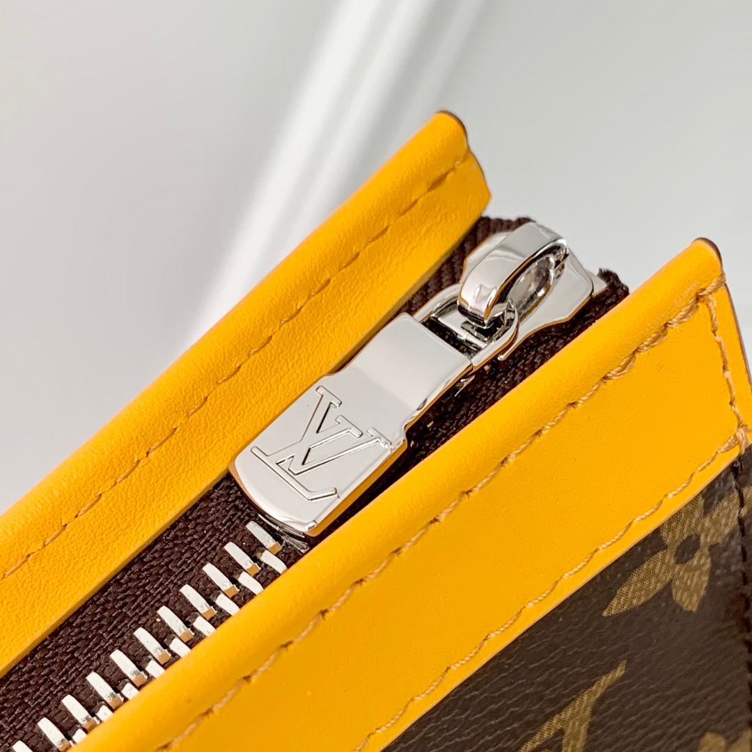LOUIS VUITTON GASTON WEARABLE WALLET 18 IN BROWN MONOGRAM CANVAS MIX YELLOW CALFSKIN
