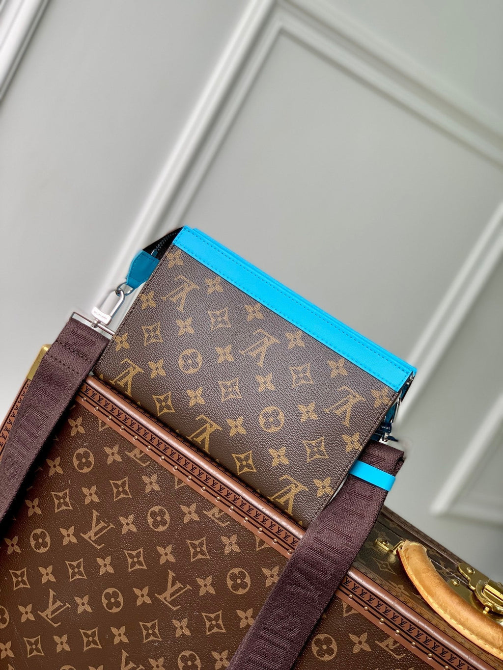 LOUIS VUITTON GASTON WEARABLE WALLET 18 IN BROWN MONOGRAM CANVAS MIX SKY CALFSKIN
