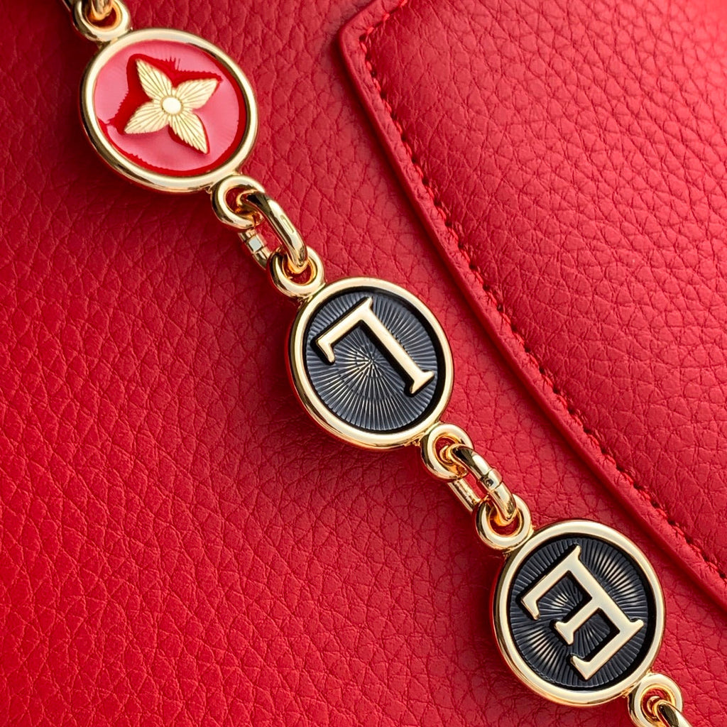 LOUIS VUITTON CAPUCINES MINI 23 IN RED TAURILLON GOLD HARDWARE
