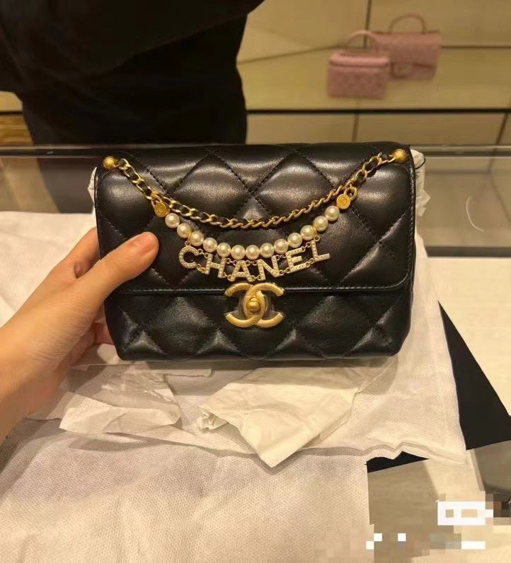 CHANEL MINI 22 FLAP BAG IN BLACK CALFSKIN GOLD HARDWARE WITH PEARL CHAIN