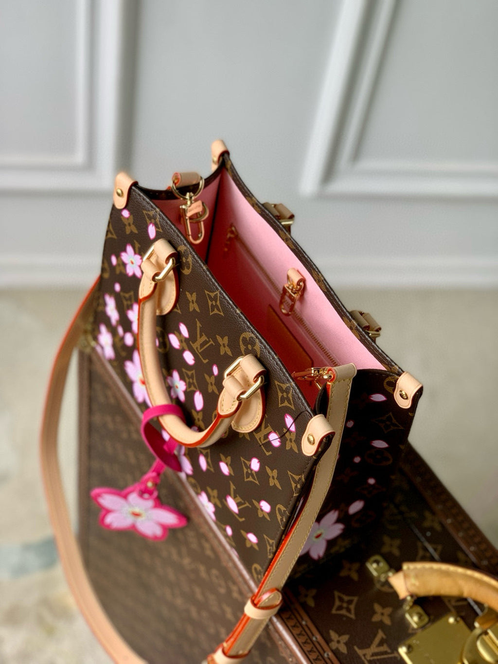 LOUIS VUITTON ONTHEGO PM CHERRY BLOSSOM IN SAKURA BROWN MONOGRAM COATED CANVAS