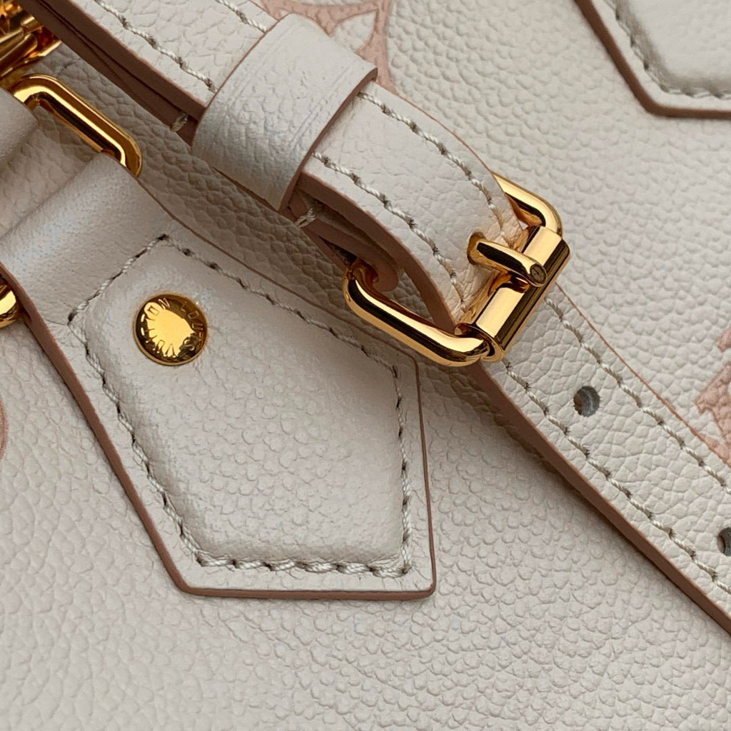 LOUIS VUITTON SPEEDY BANDOULIÈRE 20.5 IN LIGHT PINK MONOGRAM EMPREINTE CANVAS