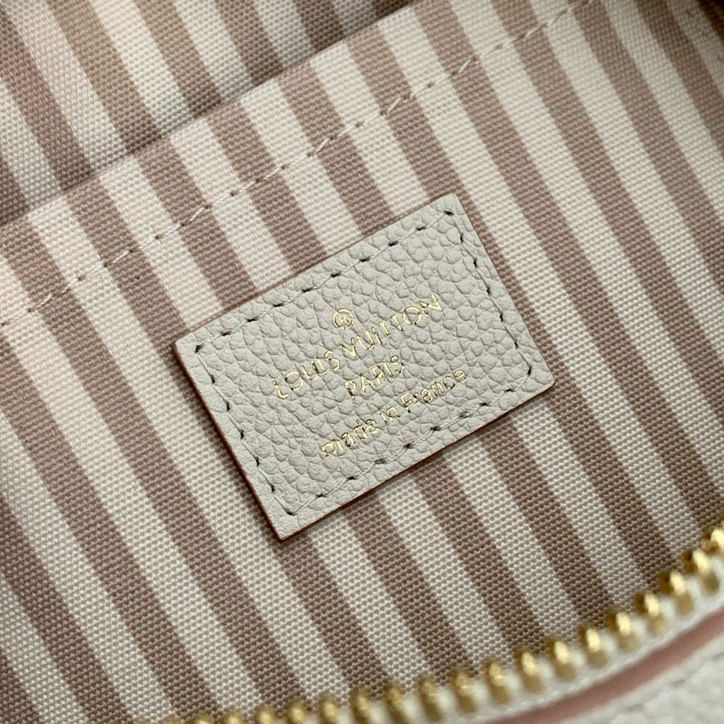 LOUIS VUITTON SPEEDY BANDOULIÈRE 20.5 IN LIGHT PINK MONOGRAM EMPREINTE CANVAS