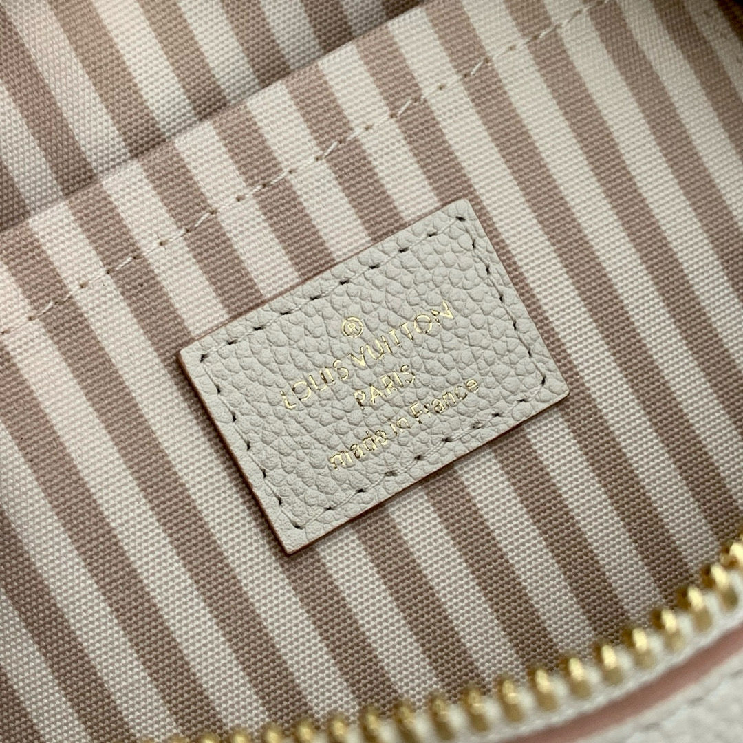 LOUIS VUITTON SPEEDY BANDOULIÈRE 20.5 IN LIGHT PINK MONOGRAM EMPREINTE CANVAS