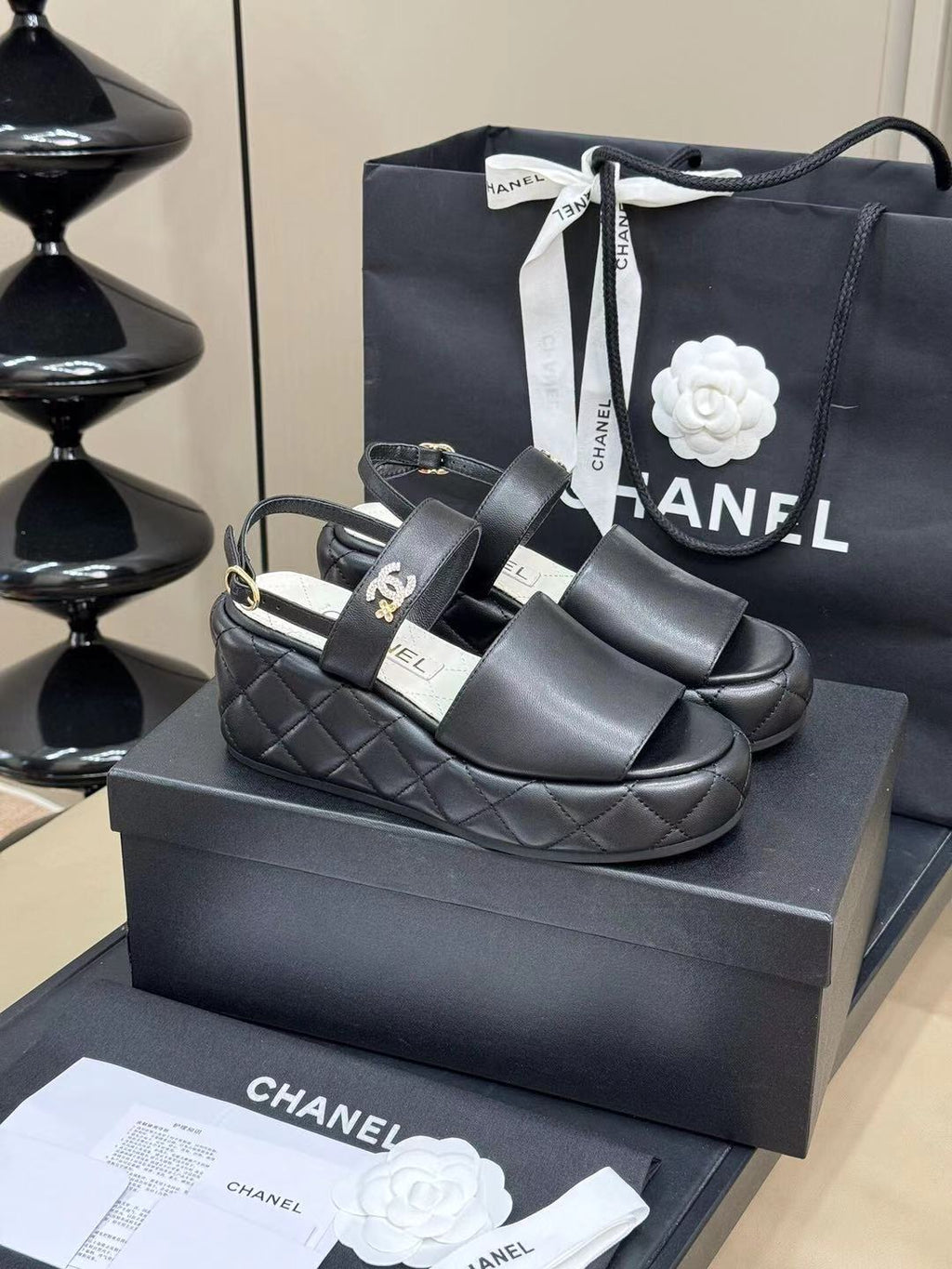 CHANEL HIGH WEDGE SANDALS IN BLACK LAMBSKIN