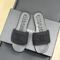 CHANEL WOVEN SLIPPERS BLACK COWHIDE SOLE