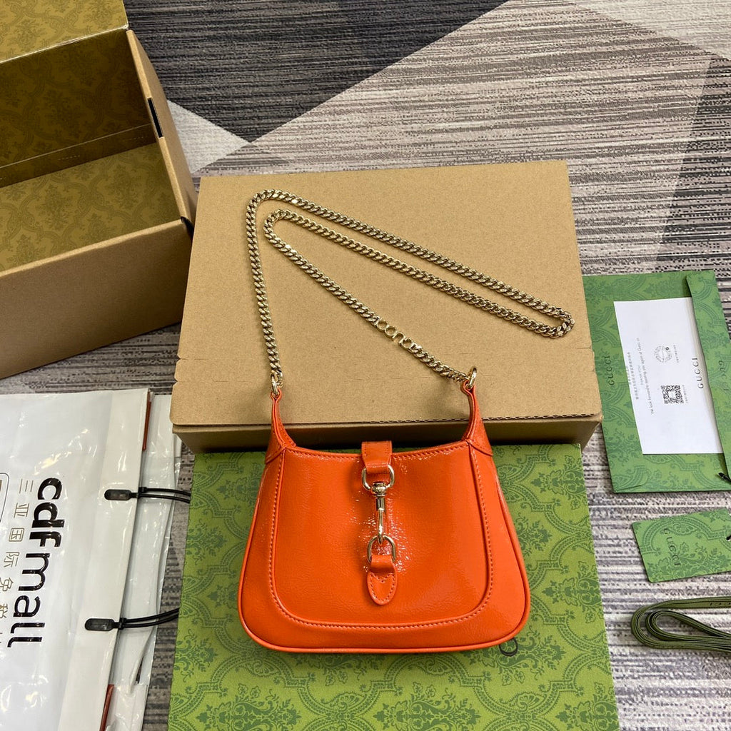 GUCCI JACKIE NOTTE MINI BAG 19 IN ORANGE CRACKED LACQUER CALFSKIN GOLD HARDWARE