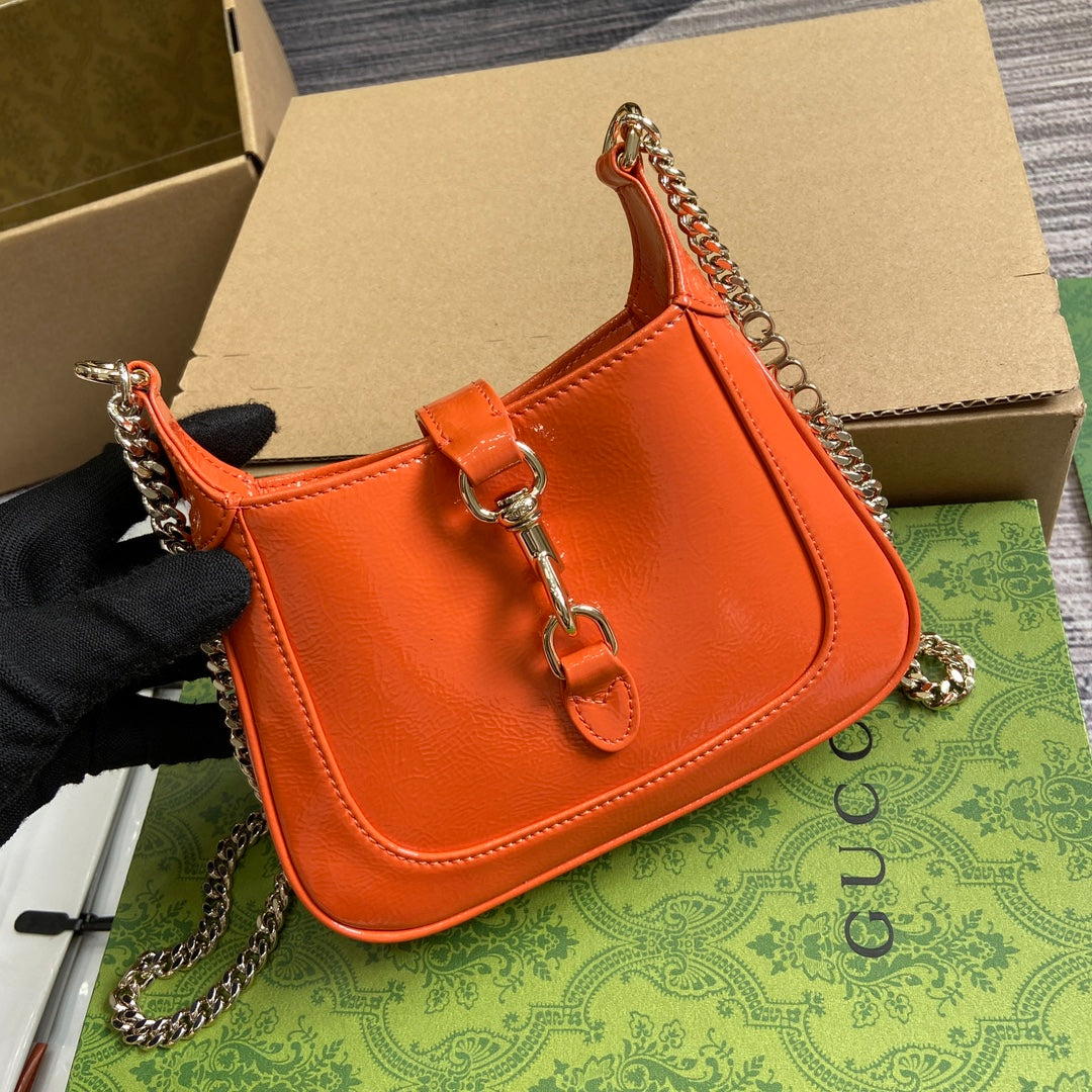 GUCCI JACKIE NOTTE MINI BAG 19 IN ORANGE CRACKED LACQUER CALFSKIN GOLD HARDWARE
