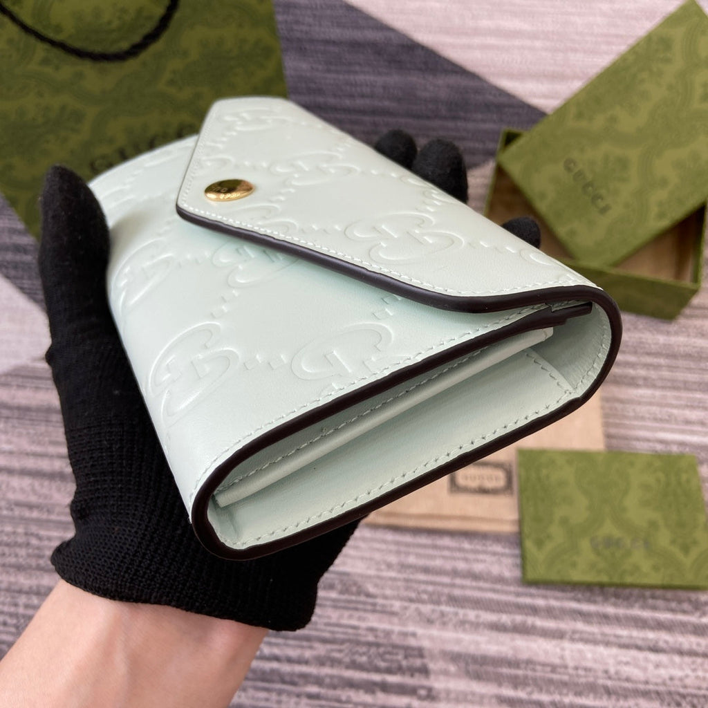 GUCCI CONTINENTAL WALLET 19 IN MINT GREEN EMBOSSED CALFSKIN GOLD HARDWARE