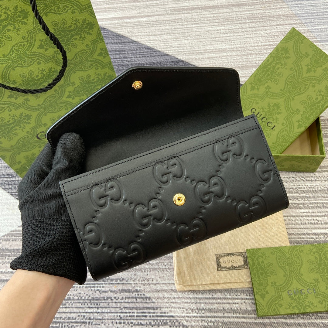 GUCCI CONTINENTAL WALLET 19 IN BLACK EMBOSSED CALFSKIN GOLD HARDWARE